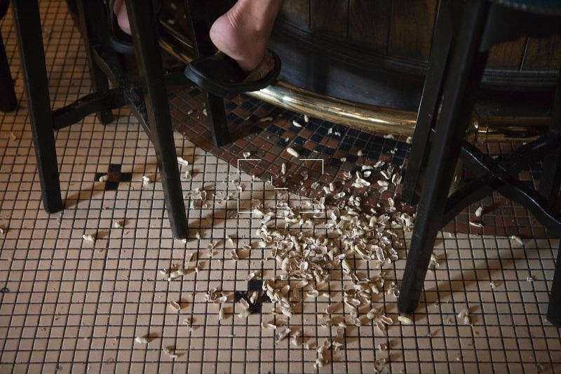 Singapore Peanut Shells on Floor of The Long Bar of Raffles Hotel